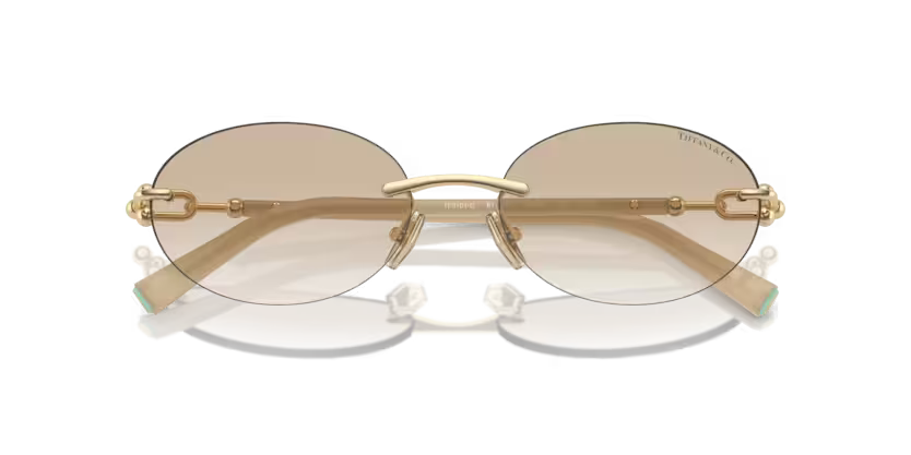 Tiffany & Co. TF3104D 617811 Pale Gold & Opal Ivory Rimless Oval Sunglasses